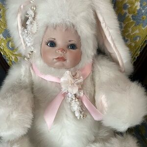 Lovely White Bunny Doll. The face has beautiful eyes with long eyelashes.